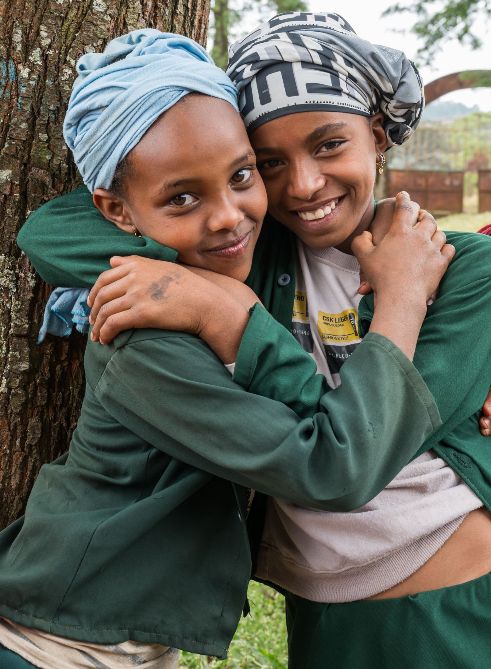 Two pickers embracing